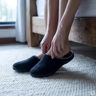 Mules Tara noires peau de pêche bordure léopard